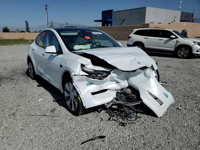 2023 Tesla Model Y VIN: 7SAYGDEE2PA184427 Lot: 57075355
