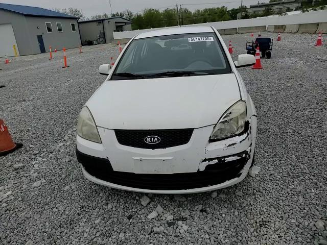 2009 Kia Rio Base VIN: KNADE223396533117 Lot: 56147735
