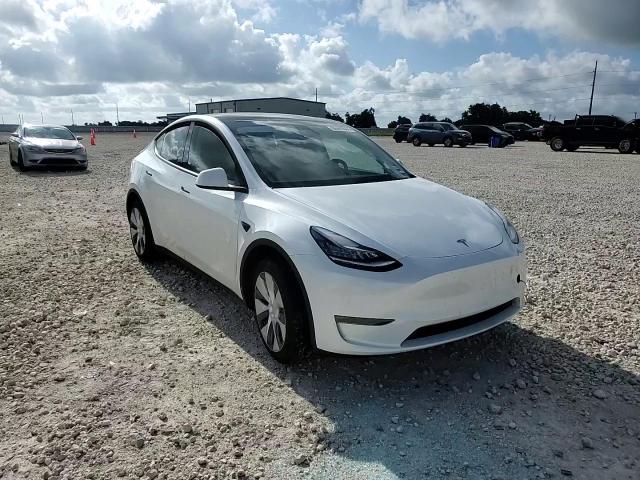 2023 Tesla Model Y VIN: 7SAYGDEEXPA128641 Lot: 60465844