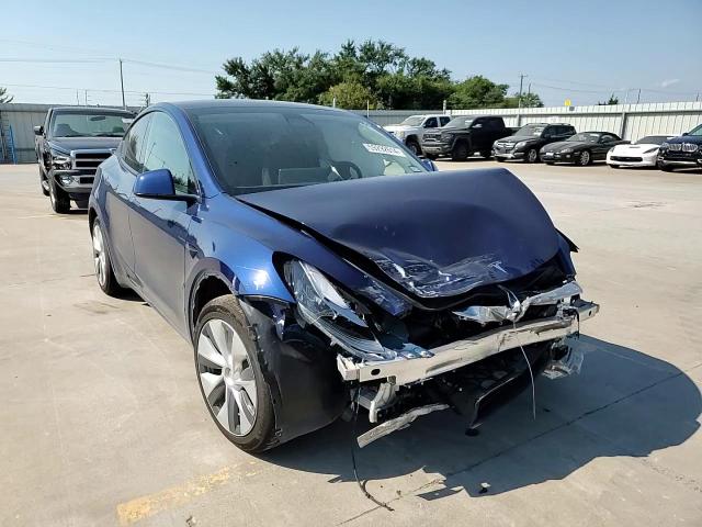 2023 Tesla Model Y VIN: 7SAYGDEE8PA124667 Lot: 59292614