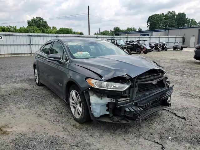 2016 Ford Fusion Titanium Phev VIN: 3FA6P0SU4GR288286 Lot: 67588095