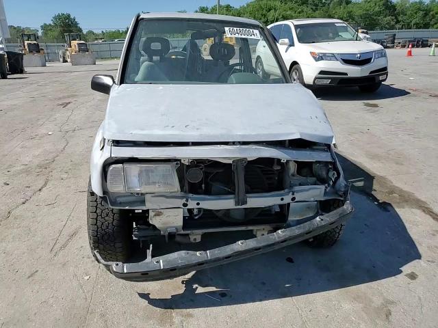 1991 Geo Tracker VIN: 2CNBJ18U3M6909006 Lot: 73638944