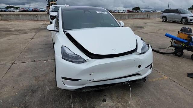 2023 Tesla Model Y VIN: 7SAYGAEE6PF802463 Lot: 60727185