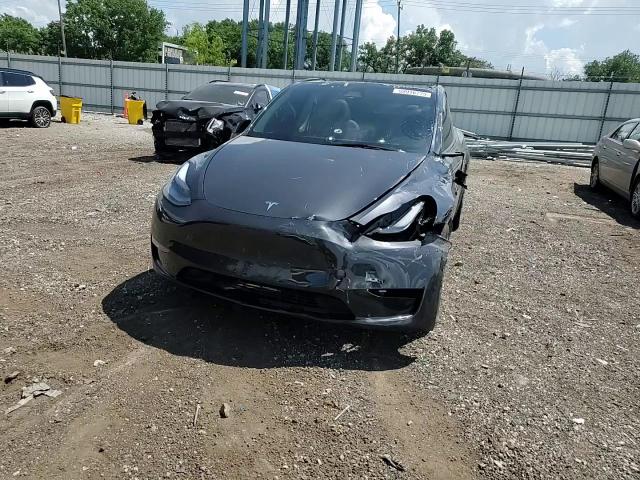 2025 Tesla Model Y VIN: 7SAYGDEE3SF252990 Lot: 59916775