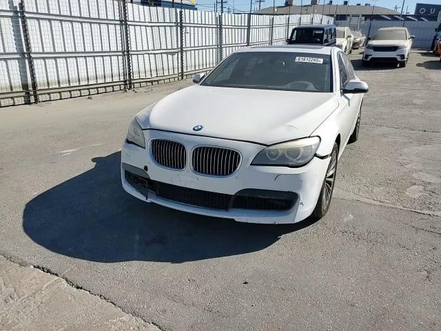 2014 BMW 740 I VIN: WBAYA6C50ED144560 Lot: 61612265