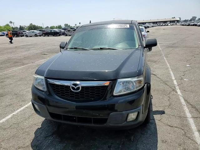 2009 Mazda Tribute I VIN: 4F2CZ02719KM06397 Lot: 59996525