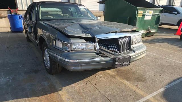 1997 Lincoln Town Car Signature VIN: 1LNLM82W9VY654095 Lot: 61899815