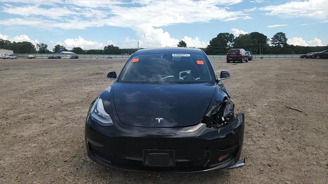 2019 Tesla Model 3 VIN: 5YJ3E1EA7KF317638 Lot: 63086215