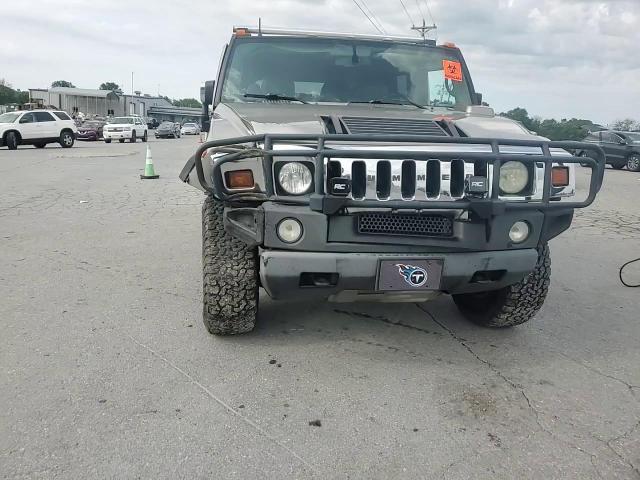 2003 Hummer H2 VIN: 5GRGN23U63H128919 Lot: 59884055