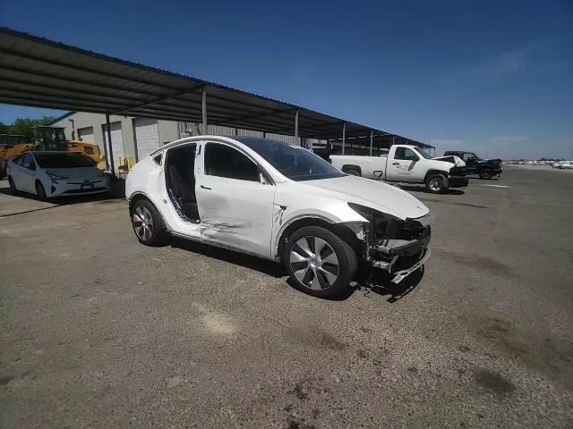 2023 Tesla Model Y VIN: 7SAYGDEE0PF637947 Lot: 61927575