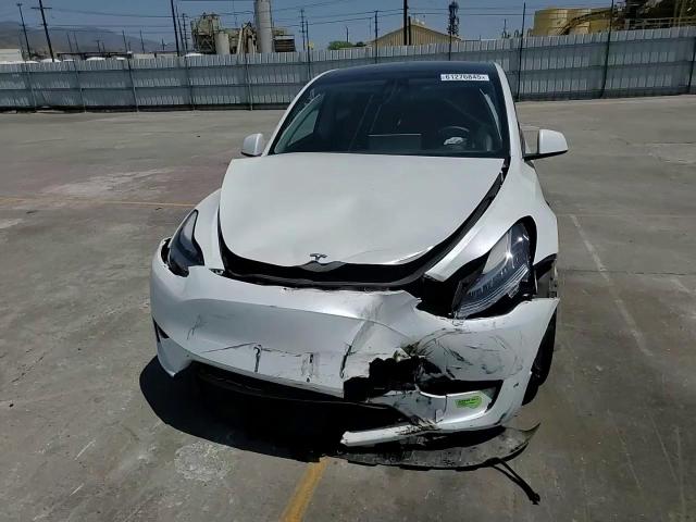 2023 Tesla Model Y VIN: 7SAYGDEE3PA120297 Lot: 61276845