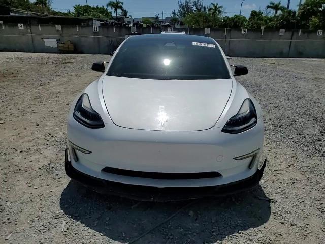2021 Tesla Model 3 VIN: 5YJ3E1EA6MF020847 Lot: 61570125