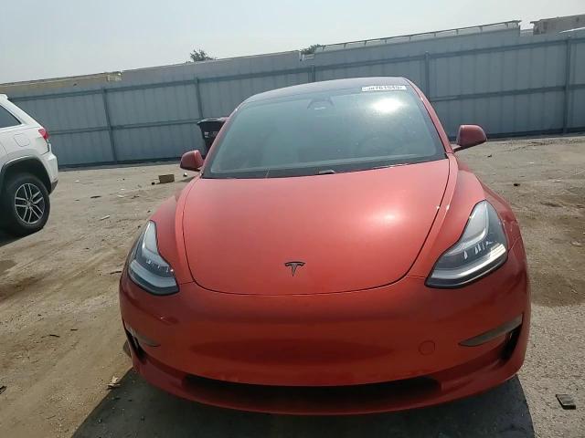 2018 Tesla Model 3 VIN: 5YJ3E1EB0JF099582 Lot: 58761545