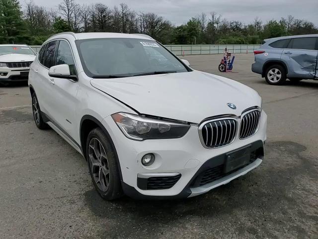 2018 BMW X1 xDrive28I VIN: WBXHT3C38J5F93215 Lot: 61880035