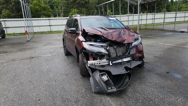 2021 Honda Passport Elite VIN: 5FNYF8H07MB002713 Lot: 64270625