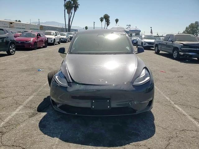 2025 Tesla Model Y VIN: 7SAYGDED3SF242855 Lot: 63055545