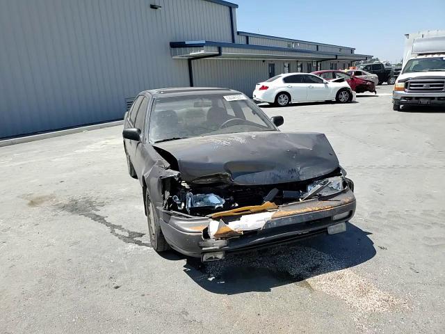 1990 Nissan Maxima VIN: JN1HJ01P2LT380413 Lot: 62397035