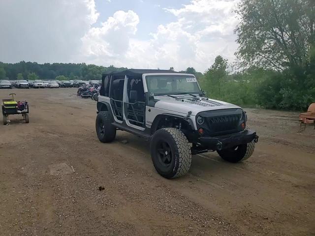 2012 Jeep Wrangler Unlimited Sport VIN: 1C4BJWDG7CL112989 Lot: 62634715