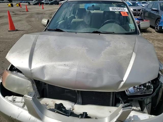 2002 Mazda Protege Dx VIN: JM1BJ225521563472 Lot: 60434555