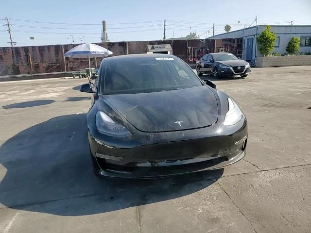 2023 Tesla Model 3 VIN: 5YJ3E1EC4PF578699 Lot: 63027725