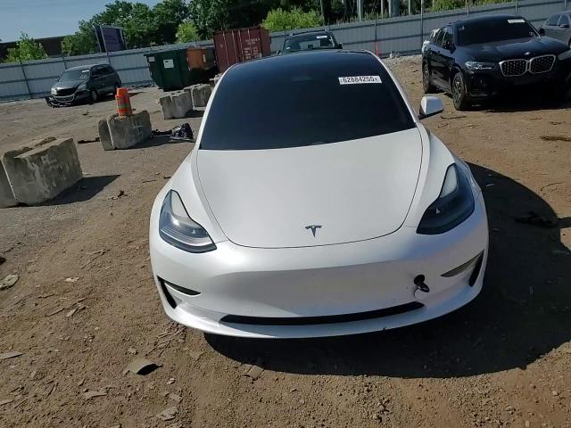 2021 Tesla Model 3 VIN: 5YJ3E1EB9MF067413 Lot: 62884255