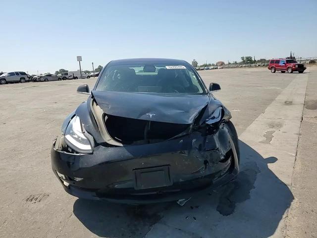 2018 Tesla Model 3 VIN: 5YJ3E1EB8JF084716 Lot: 62495485