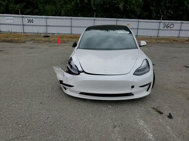 2021 Tesla Model 3 VIN: 5YJ3E1EA2MF870703 Lot: 62719565
