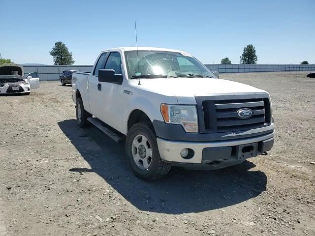 2011 Ford F150 Super Cab VIN: 1FTFX1EF7BFC06764 Lot: 62955815