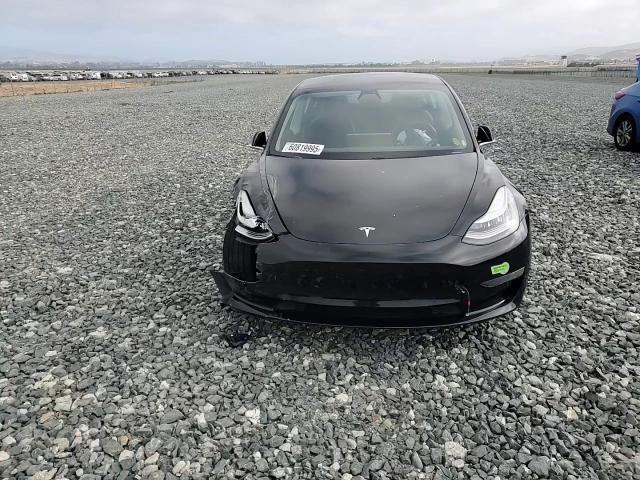2019 Tesla Model 3 VIN: 5YJ3E1EB4KF385582 Lot: 60819995