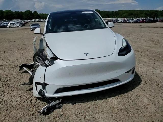 2022 Tesla Model Y VIN: 7SAYGAEE1NF520115 Lot: 63104885