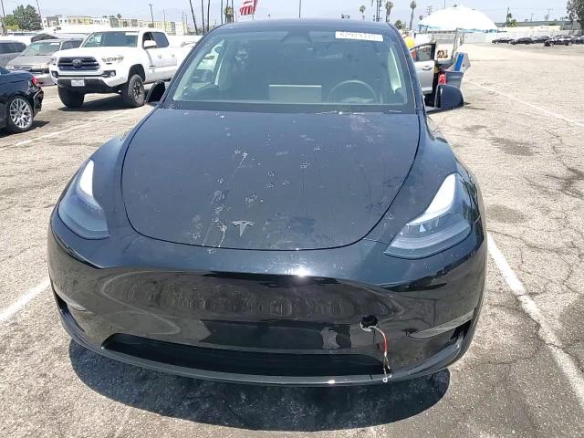 2025 Tesla Model Y VIN: 7SAYGDED7SF257259 Lot: 62929315