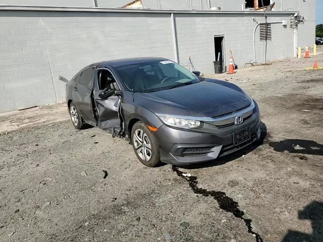 2018 Honda Civic Lx VIN: 19XFC2F50JE040698 Lot: 62929305