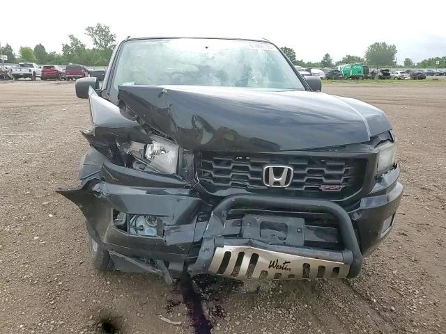2014 Honda Ridgeline Sport VIN: 5FPYK1F79EB001431 Lot: 61464195