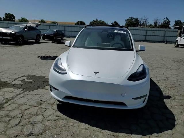 2023 Tesla Model Y VIN: 7SAYGDEE9PF849360 Lot: 60666515