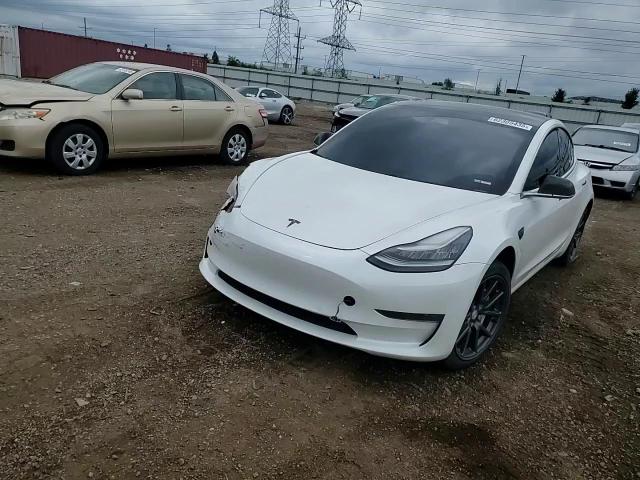 2019 Tesla Model 3 VIN: 5YJ3E1EB4KF469210 Lot: 62305435