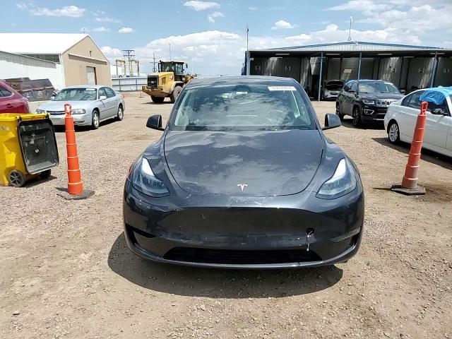 2025 Tesla Model Y VIN: 7SAYGDEF2SF300326 Lot: 63039455