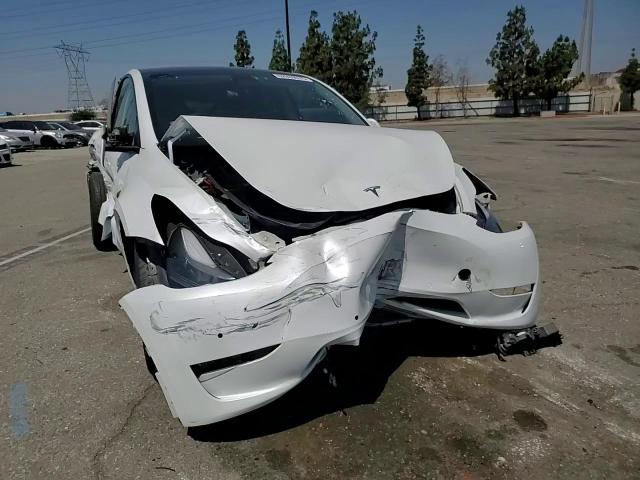 2022 Tesla Model Y VIN: 7SAYGAEE7NF541230 Lot: 62939975