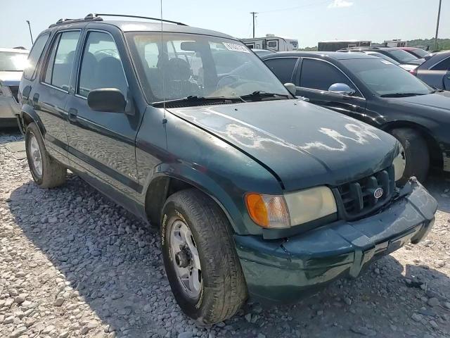 2000 Kia Sportage VIN: KNDJA7231Y5675677 Lot: 61031795