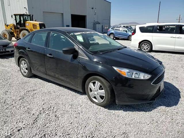 2017 Ford Focus S VIN: 1FADP3E2XHL329104 Lot: 65460824