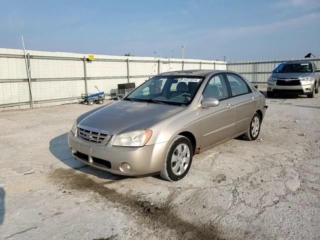 2004 Kia Spectra Lx VIN: KNAFE121245009232 Lot: 64075514