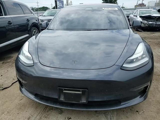 2018 Tesla Model 3 VIN: 5YJ3E1EAXJF021821 Lot: 61427204