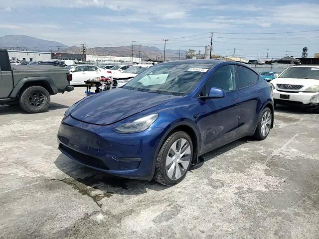 2023 Tesla Model Y VIN: 7SAYGDEE6PA198637 Lot: 62956474