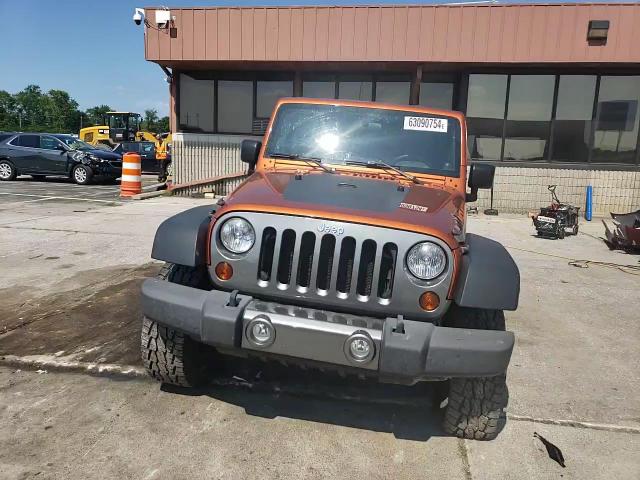 2010 Jeep Wrangler Unlimited Sport VIN: 1J4BA3H11AL219600 Lot: 63090754