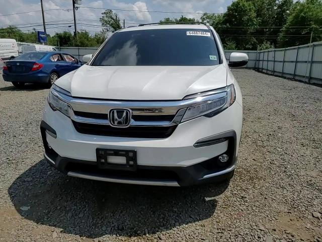 2022 Honda Pilot Touring VIN: 5FNYF6H94NB001099 Lot: 64887484