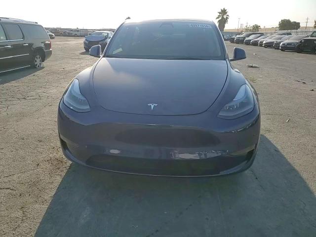 2023 Tesla Model Y VIN: 7SAYGDEE6PF764170 Lot: 62871014