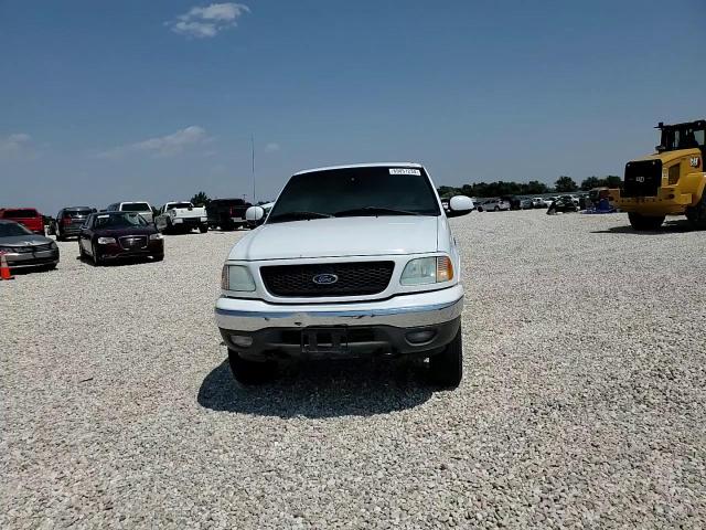 2002 Ford F150 VIN: 1FTRX18W22NA61275 Lot: 65051234