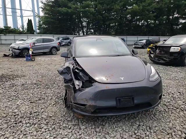 2023 Tesla Model Y VIN: 7SAYGDEE8PF878042 Lot: 64807834