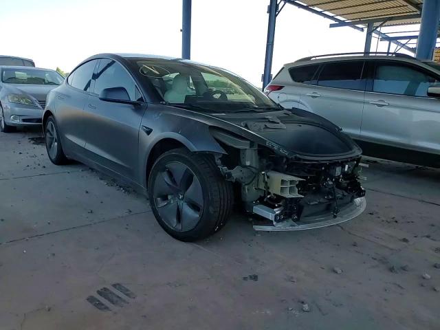 2018 Tesla Model 3 VIN: 5YJ3E1EB0JF096083 Lot: 61271404