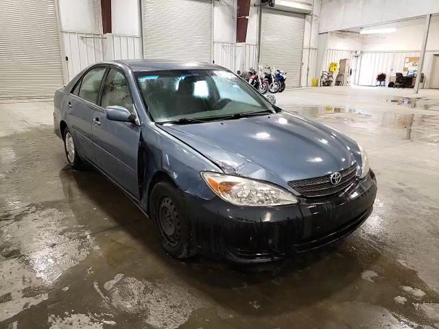 2003 Toyota Camry Le VIN: JTDBE32K530156114 Lot: 64930254