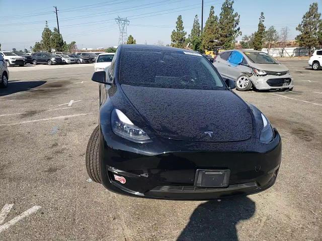 2024 Tesla Model Y VIN: 7SAYGAEE2RF009101 Lot: 63168334